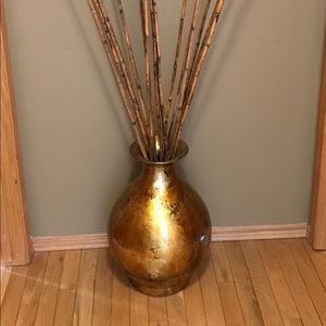 Vase with bamboo decorative sticks